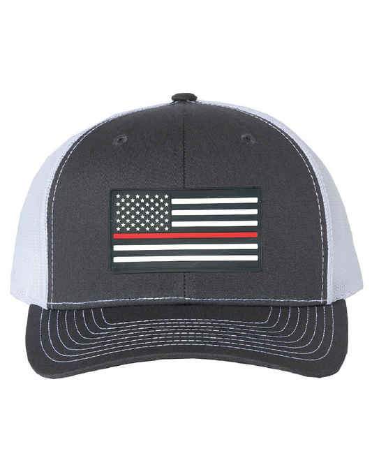 USA Flag Red Line PVC Patch on a Richardson 112 Trucker Hat